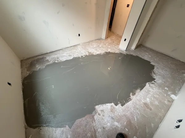 A freshly treated area shows how surface corrections become part of the installation.
