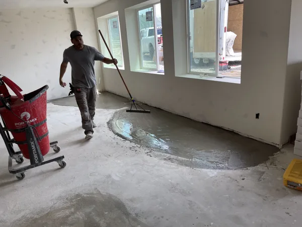 Our installer works through the room before flooring installation begins.