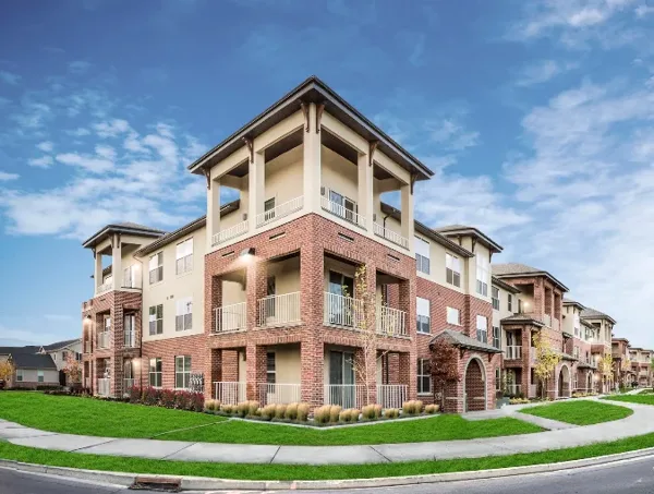 The finished multi-story community building.