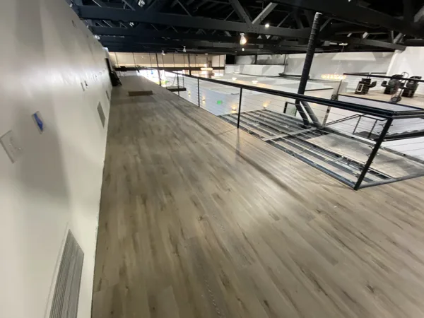 A view of the LVP installation work, finished areas or flooring details at The Beauty Stop.