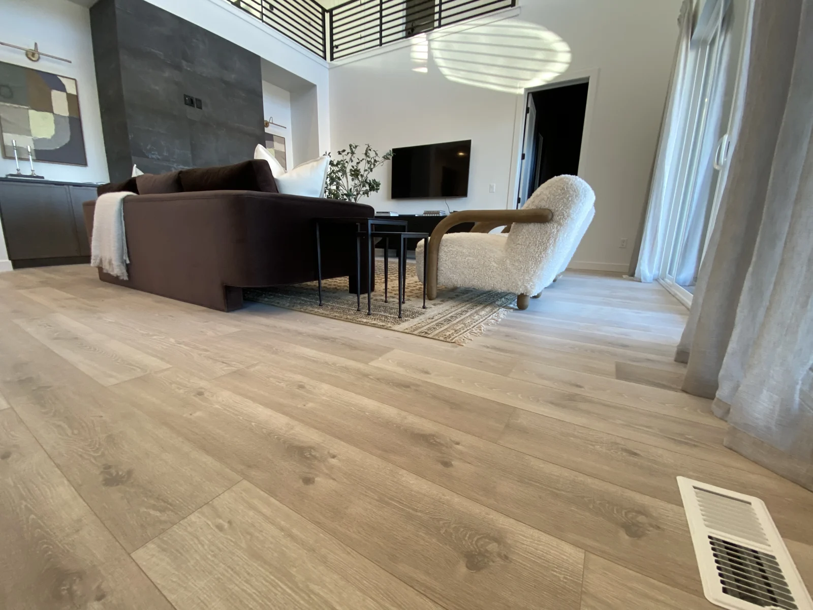 Finished laminate flooring in The Basin living and dining space