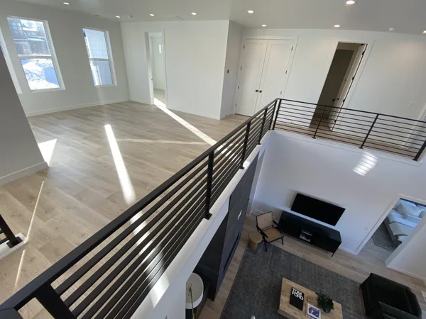 Flooring at the railing overlooking the living space.