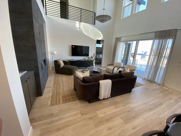Wood-look laminate through the furnished living room.