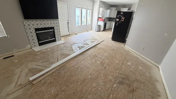 Plank flooring through the kitchen and adjoining living space.
