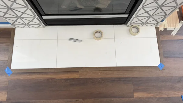Plank flooring through the kitchen and adjoining living space.