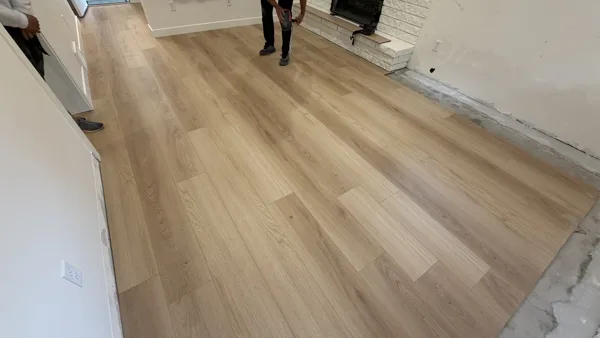 Replacement plank flooring in the basement rooms and hallway.