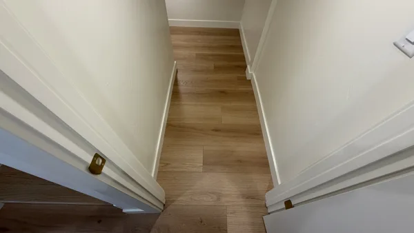 Replacement plank flooring in the basement rooms and hallway.