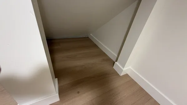 Replacement plank flooring in the basement rooms and hallway.