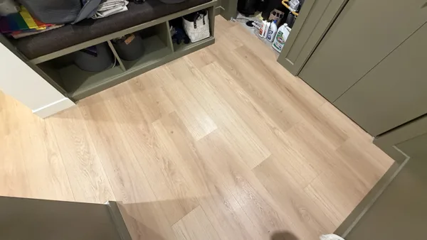 Replacement plank flooring in the basement rooms and hallway.